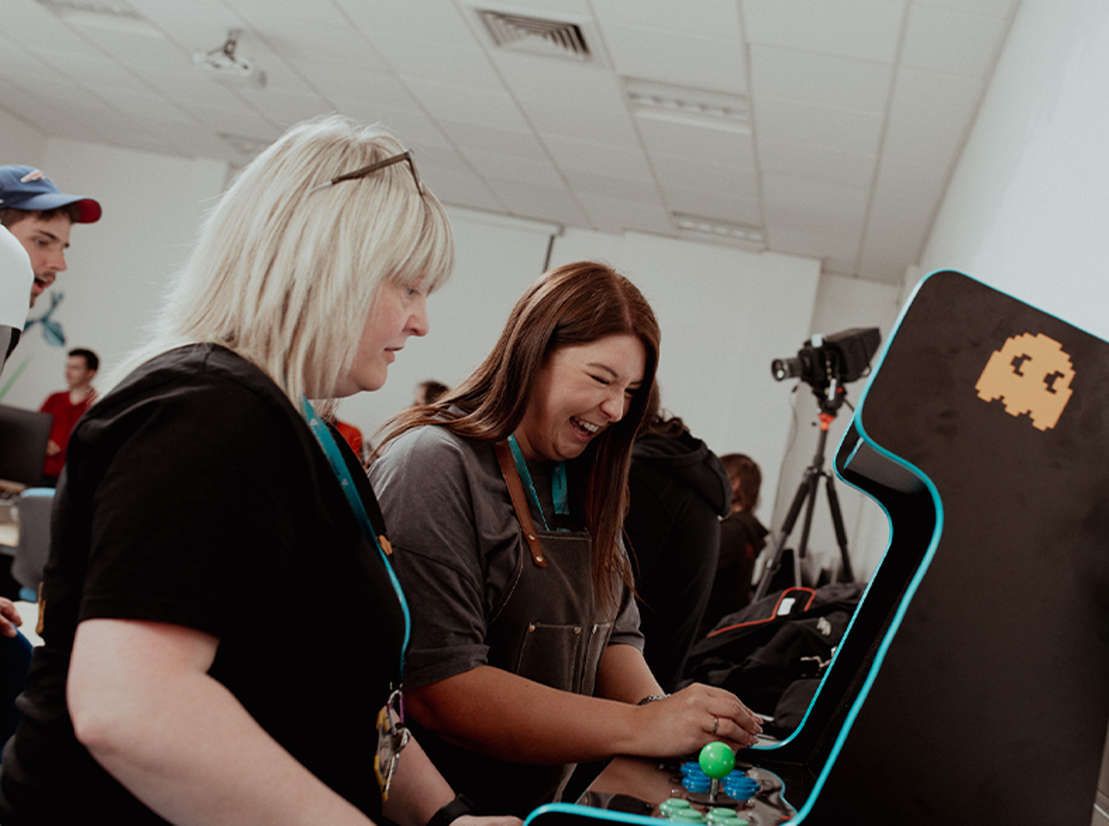 fife college lecturer and student playing arcade game
