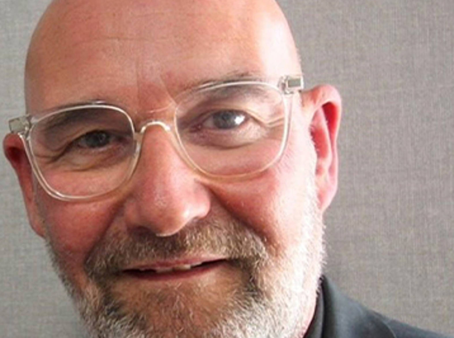 bill banks alumni smiling at camera