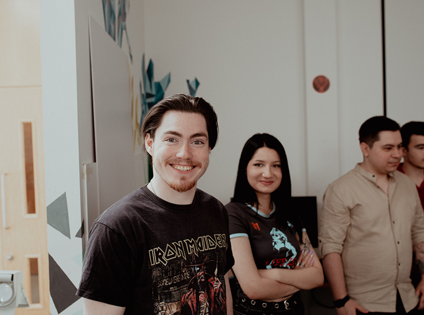 gaming students smiling at camera