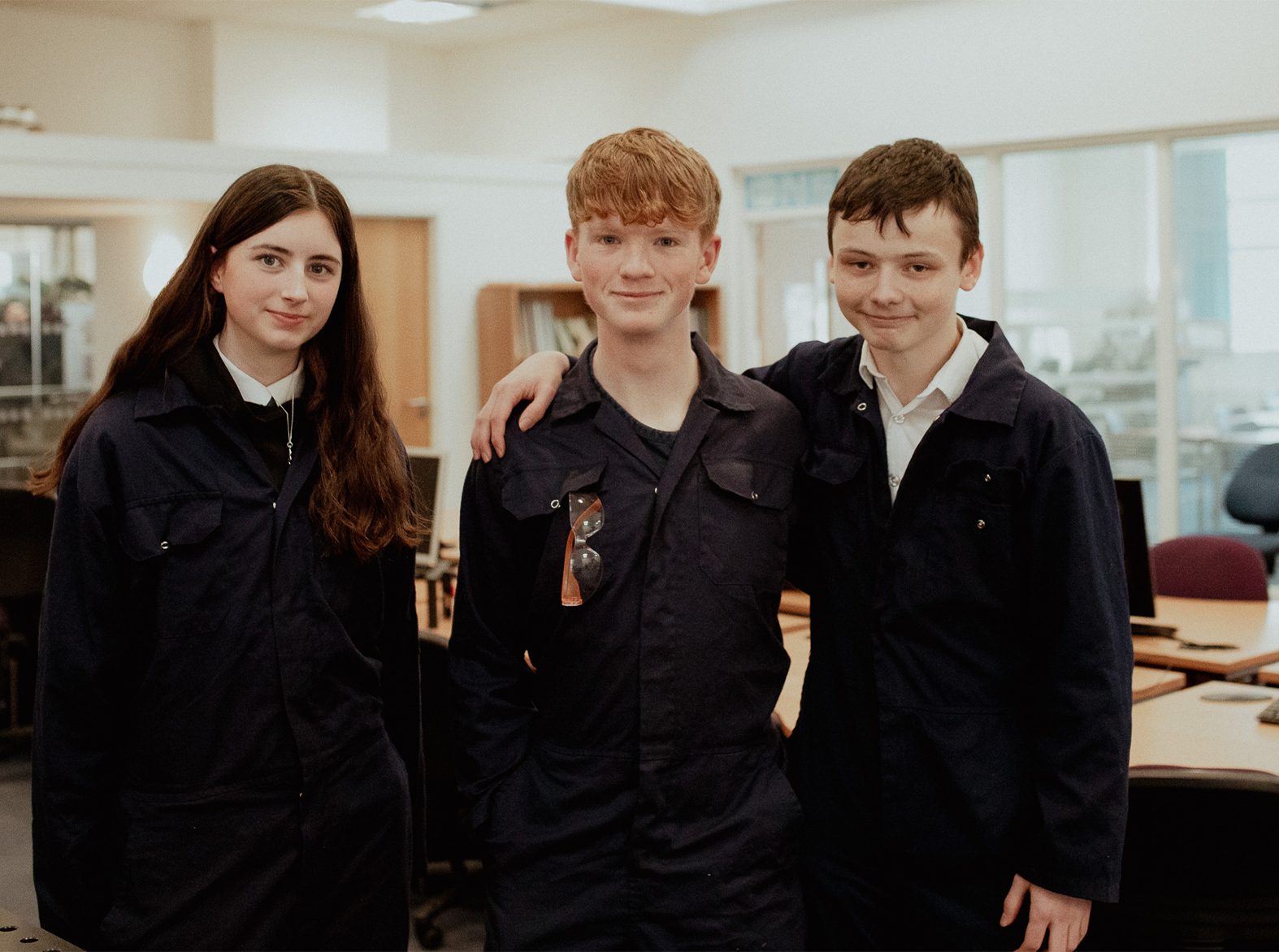 SCP students in group smiling at camera