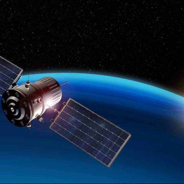 satelite in space with planet in background