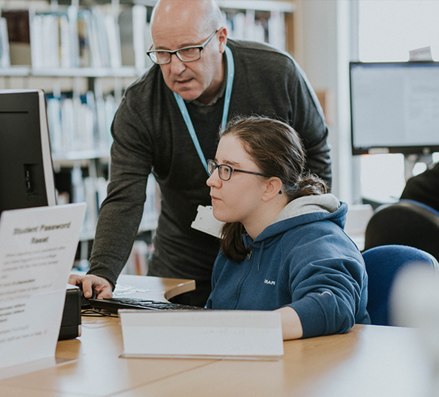 lecturer with student