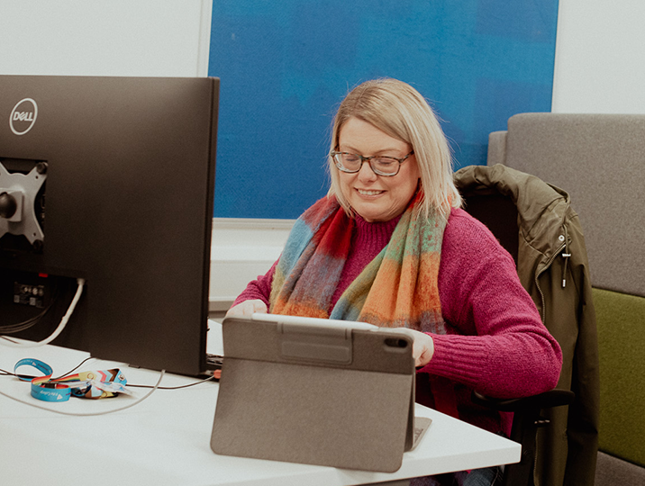 svq female student working on laptop