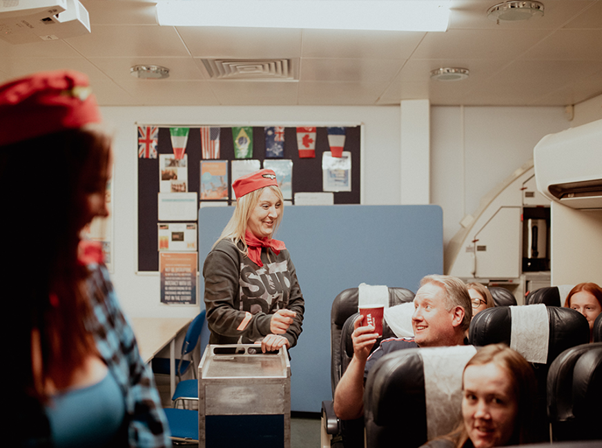 travel and tourism flight attendant student in cabin classroom