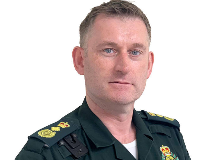 daren mochrie alumni smiling at camera