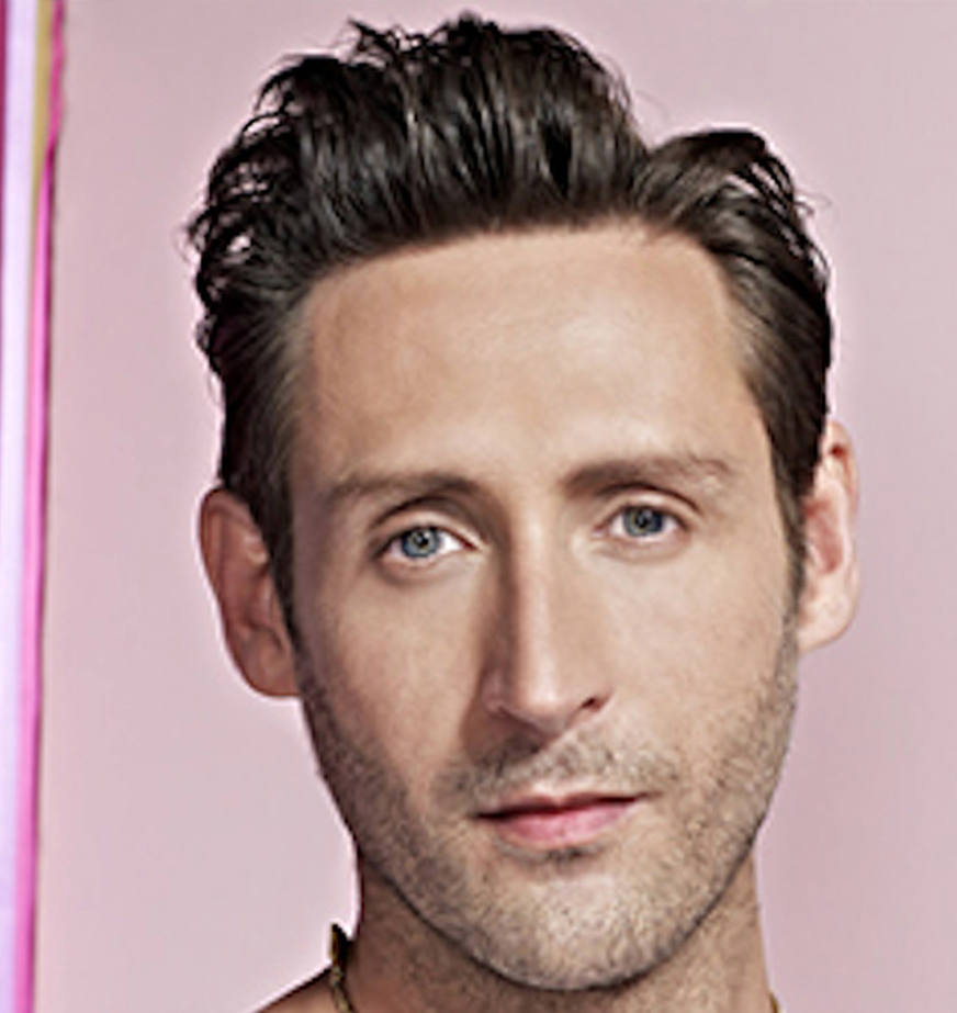 Headshot of a male hair stylist 