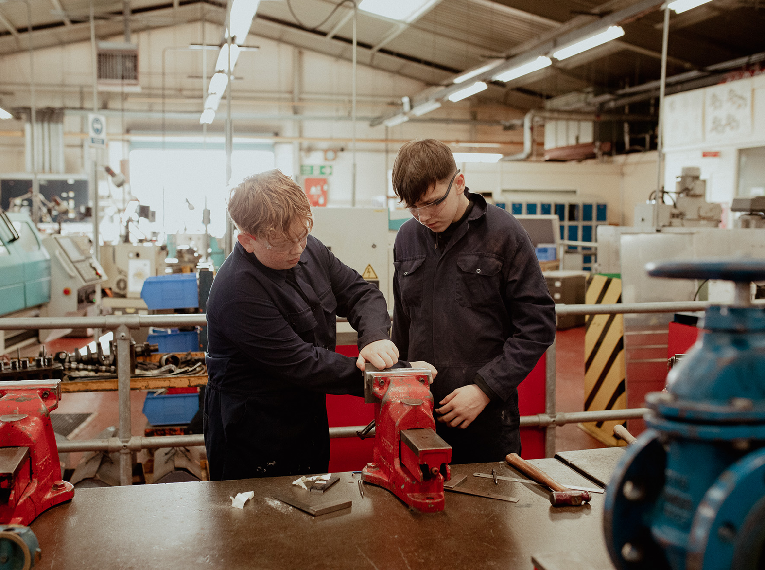 modern apprenticeship students using tools